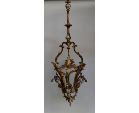 A French taste gilt metal hall lantern, 20th century, the frame of three panel form with scrolling leaf surmount, with ribbon