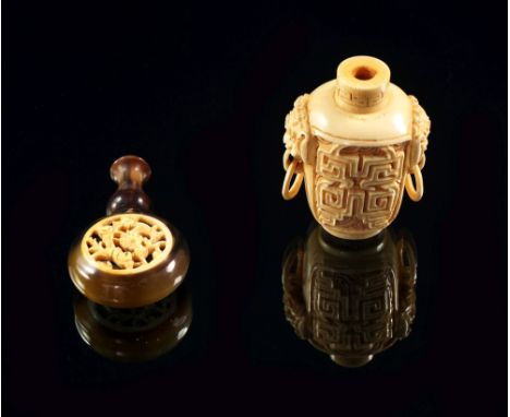 A Chinese ivory and horn snuff bottle, early 20th century, in the form of a flask, the body inset with pierced panels of drag