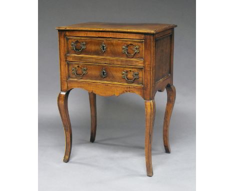 A Continental walnut commode, 18th/19th century, with two frieze drawers, on curving cabriole legs, 81cm high x 58cm wide x 4
