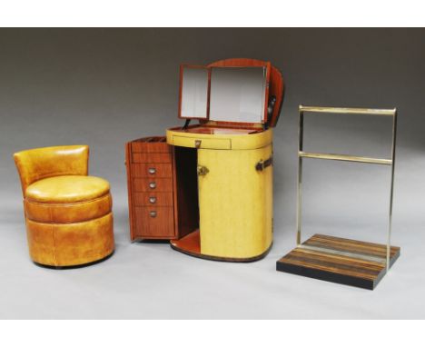 A trunk style vanity unit, 20th century, bound in faux leather, opening to reveal fitted interior, 111cm high x 60cm wide x 4
