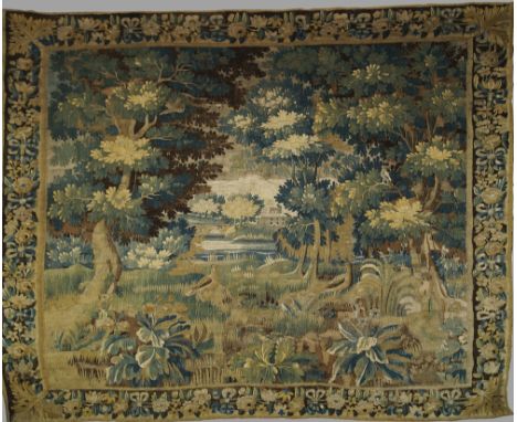A Flemish tapestry, 17th Century , with trees enclosing a view of a house by a lake, two birds in the foreground, 260 x 240 c