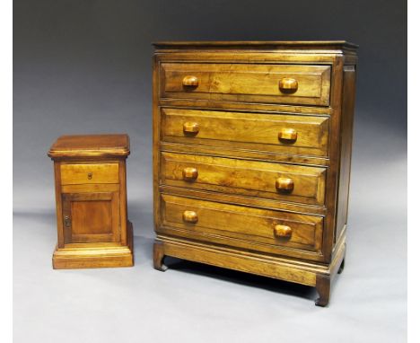 A pair of hardwood chest of drawers, 20th century, four long drawers on bracket feet, 110cm high x 85cm wide x 46cm deep; tog