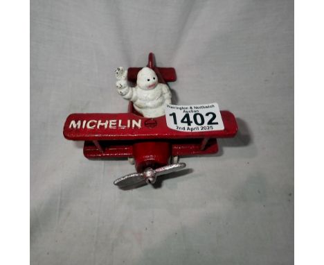 Cast iron Michelin Man in plane figure, L: 12 cm. UK P&amp;P Group 1 (£16+VAT for the first lot and £2+VAT for subsequent lot