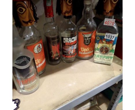 Six novelty vodka bottles including Vlad the Impaler and Draculas Blood. Not available for in-house P&amp;P 