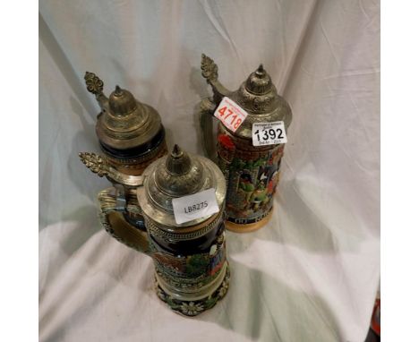 Three German steins with pewter lids. UK P&amp;P Group 2 (£20+VAT for the first lot and £4+VAT for subsequent lots)&nbsp; 