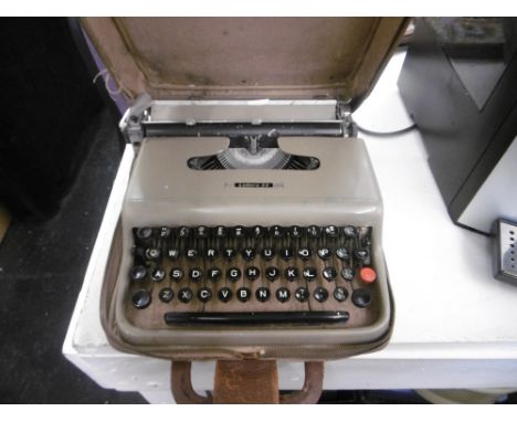 a vintage cased typewriter