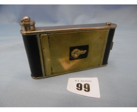 An art deco compact in camera form