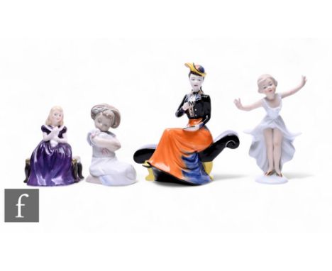 A Lorna Bailey limited edition figure 'Afternoon Tea', modelled as a lady drinking tea and seated on a black and yellow chais