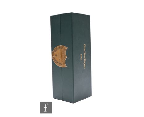 A bottle of 1983 Dom Perignon champagne, in sealed box.
