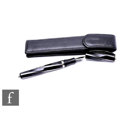 A Visconti Divina black gloss fountain pen, with striped wrythen barrel and cap and with a pull and twist filling system, the