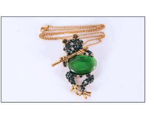 Green Crystal and Cat's Eye Pendant/Brooch, an amusing figure of a frog playing a flute, the head and legs in emerald green a