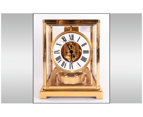 Jaeger-LeCoultre Atmos Clock Brass Glazed Case Enclosing A Circular White Enamel Chapter Ring With Roman Numerals Inscribed J