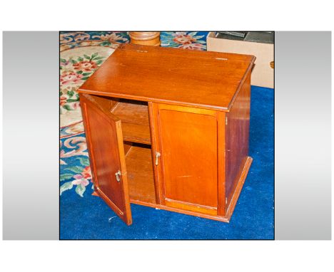 Mahogany Double Door Table Cabinet with a hinged lift up top with single interior shelf. 20 inches wide and 15 inches deep an