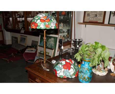 Leaded Glass Table Lamp In The Tiffany Style with a floral design shade on a gilt metal base. 28'' in height. With a smaller 