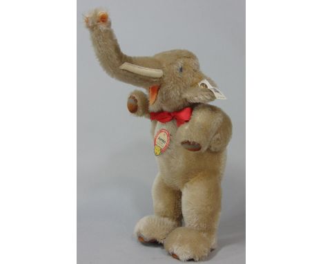 1988 Steiff toy 'Jumbo' 0125/24 with mechanical feature whereby head moves when tail is turned (replica of the 1932 original)
