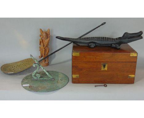 A Victorian walnut and brass banded writing slope, a nutcracker in the form of a crocodile, a 19th century pierced brass and 