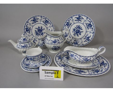 A quantity of Johnson Brothers Indian pattern wares comprising sauce boat and stand, oval serving plate, 45 plates and dishes