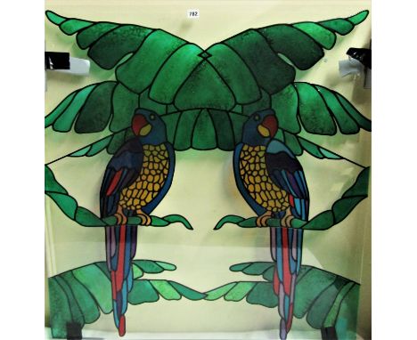 Interesting glass panel with over painted decoration of two opposing parrots sat on palm leaves, 106 x 95cm 