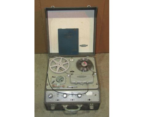 A Garrard record player model SP 25 MKIII, four transistor radios, varying models, and a vintage cased portable Ferrograph, s