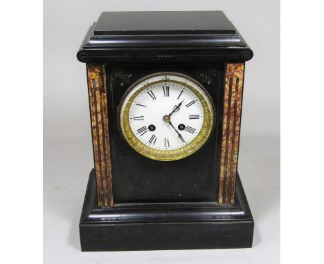 19th century black slate twin train mantel clock, the enamel dial with Roman numerals and darted borders and an architectural