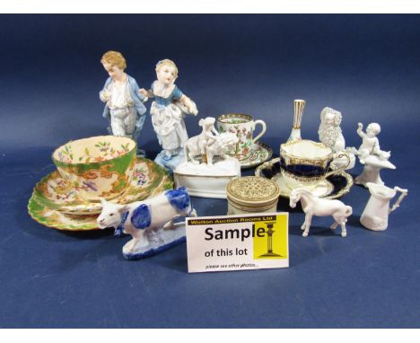 A collection of Minton's teawares, Coalport coffee wares, a pair of 19th century continental figures of a boy and a girl with