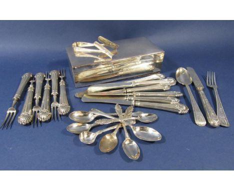 A mixed collection of silver flatware comprising an interesting engraved knife, fork and spoon set, collection of silver hand