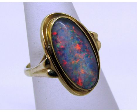 Arts &amp; Crafts style 9ct oval opal ring in closed back setting, size K/L, 3.8g 