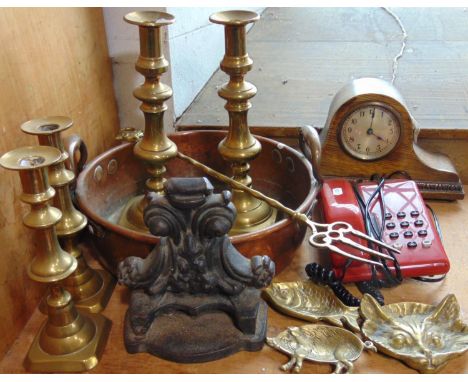 A 19th century copper jam pan, two pairs of Victorian brass candlesticks, an oak mantle clock with shaped outline, a vintage 