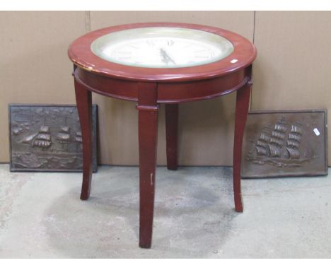 A novelty contemporary circular occasional table with inset dial clock with battery movement