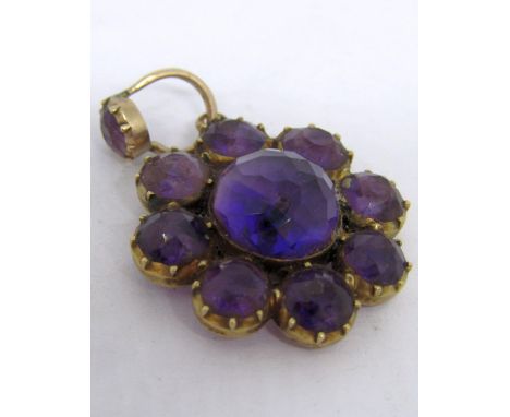 Victorian yellow metal and rose cut amethyst flower head pendant, with locket compartment verso, 3.3cm L approx, 5.4g 