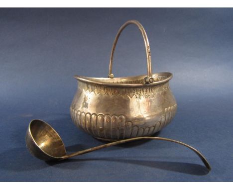 Victorian silver oval baluster handled sucrier with hinged arched handle and half fluted decoration, maker marks worn, London