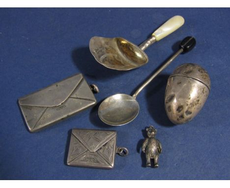 A good collection of bijouterie silver to include two silver envelope stamp boxes, a silver trinket box in the form of an egg