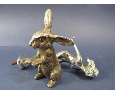 Vintage chrome green goddess type car mascot in the form of a nude nymph, 15 cm high, together with a further cast white meta
