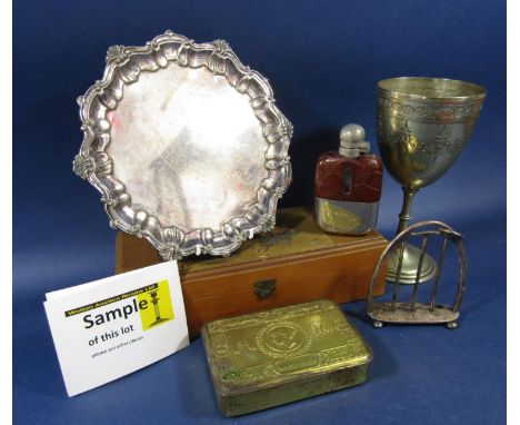 A mixed lot comprising a canteen of silver plated fish cutlery, a chalice, a toast rack, together with a further carriage clo