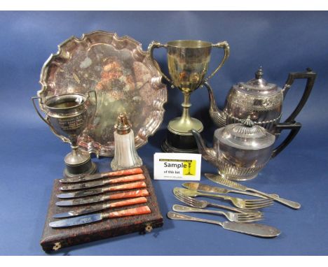 A box containing a large collection of silver plated items to include a five bottle cruet, various flatware, candelabra teawa