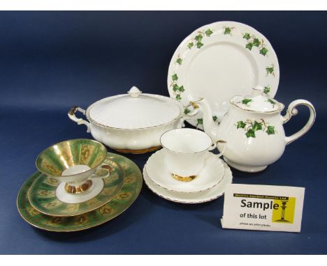 An extensive collection of Royal Albert Val D'Or dinner wares with gilt border on a white ground, comprising a pair of tureen