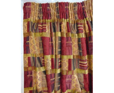 1 pair bespoke made full length curtains in contemporary fabric with a patchwork design in chenille and satin. Colours are bu