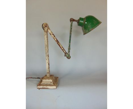 A Dugill's Patent Industrial iron work adjustable bench lamp with green enamel shade 