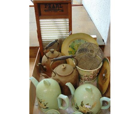 A four piece ceramic tea and coffee set overlaid with timber, with painted detail, two copper kettles, a wash board, a Smith'