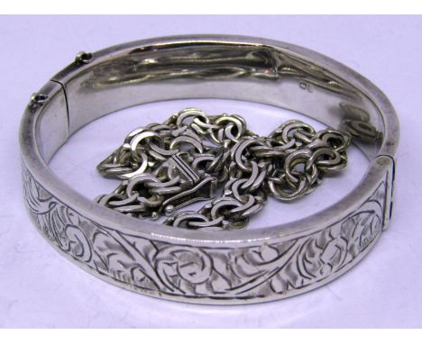 Antique silver bangle, with engraved scrolled foliate decoration, maker JS, Chester 1885, together with a further Nils-Eric S