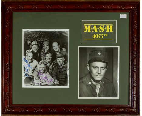 M*A*S*H*. Autographs. A b&amp;w photographic group portrait signed by the following seven cast members in different coloured 