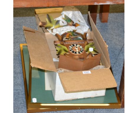 German cuckoo clock and pair of prints 