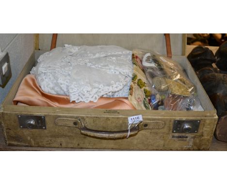 Landsdowne Jermyn St London cream suitcase, peach satin strapless evening dress, white embroidered net bed cover, silk drawst