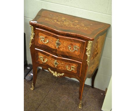 A fine French Louis XV style rosewood, Kingwood, floral marquetry and gilt metal mounted petit commode, late 19th century, of