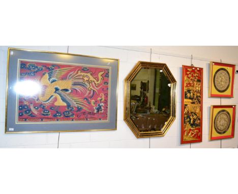 A Chinese parcel gilt red lacquered panel, a large framed Chinese needlework panel; two smaller panels; and a gilt framed mir