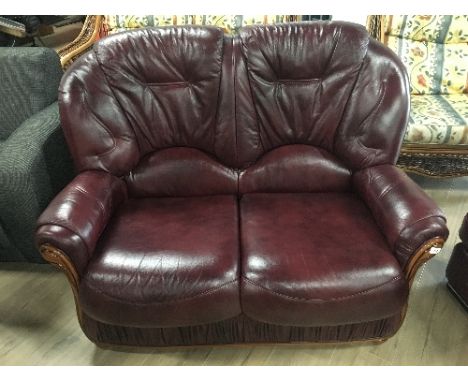 BURGUNDY LEATHER 2 SEATER SOFA