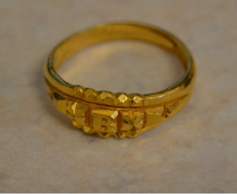 Tested as between 18ct and 22ct gold Oriental gold monogram ring (initial R), approx weight 5.5g, Ring Size P