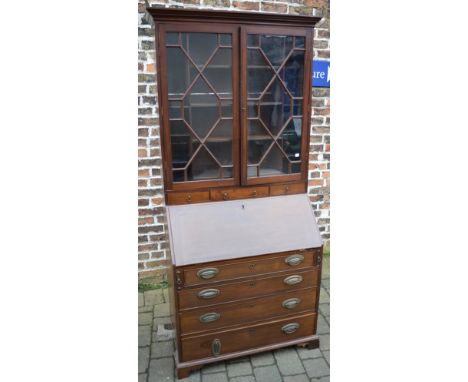 Georgian mahogany bureau with bookcase in the Chippendale style over (back foot requires repairs) W91cm H210cm