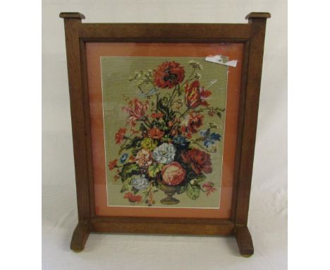 Wooden fire screen with floral tapestry