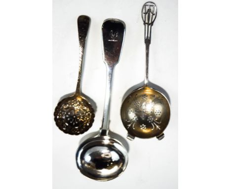 A silver tea strainer, Sheffield 1943, a silver sugar sifter spoon, Birmingham 1898 and a silver sauce ladle, London 1831, 5o